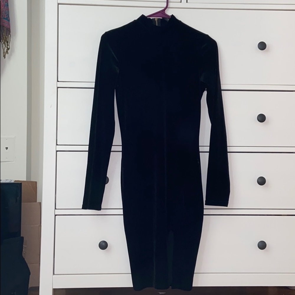 A velvet bodycon long sleeve turtle neck dress